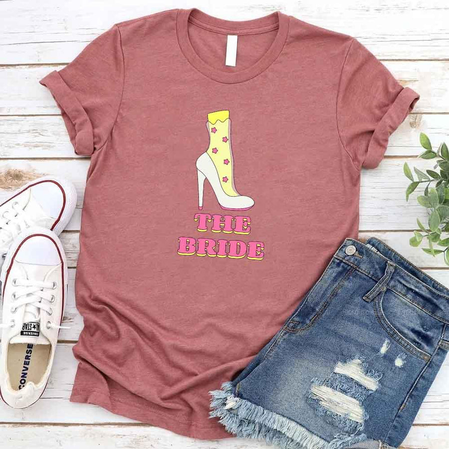 May include Mauve Team Bride & The Bride Bachelorette Party Matching T-Shirts, featuring "Team Bride" and "The Bride" designs in soft cotton fabric, perfect for pre-wedding celebrations and group photos.