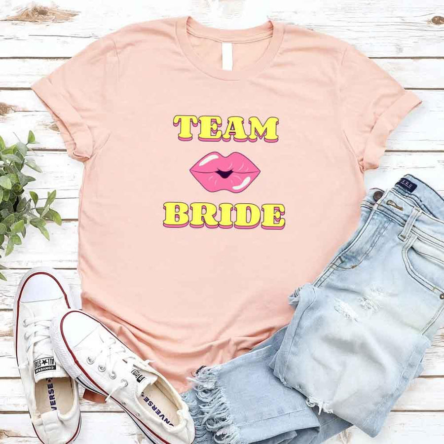 May include Peach Team Bride & The Bride Bachelorette Party Matching T-Shirts, featuring "Team Bride" and "The Bride" designs in soft cotton fabric, perfect for pre-wedding celebrations and group photos.