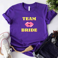 May include Team Purple Team Bride & The Bride Bachelorette Party Matching T-Shirts, featuring "Team Bride" and "The Bride" designs in soft cotton fabric, perfect for pre-wedding celebrations and group photos.