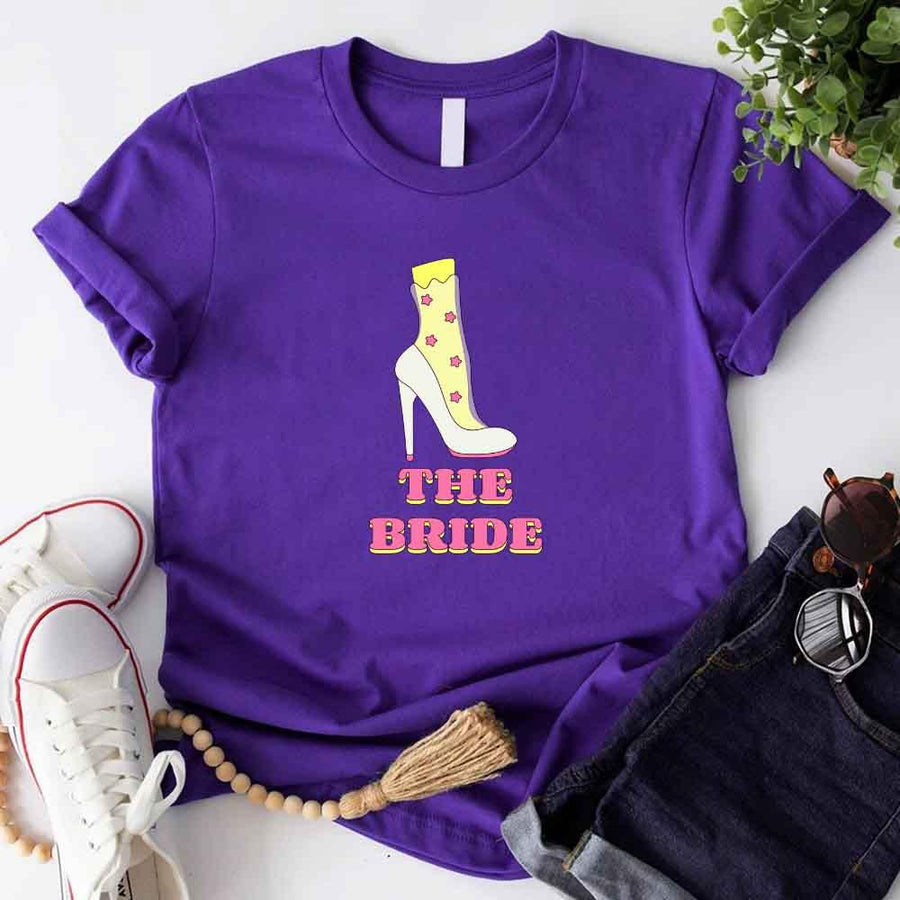 May include Team Purple Team Bride & The Bride Bachelorette Party Matching T-Shirts, featuring "Team Bride" and "The Bride" designs in soft cotton fabric, perfect for pre-wedding celebrations and group photos.