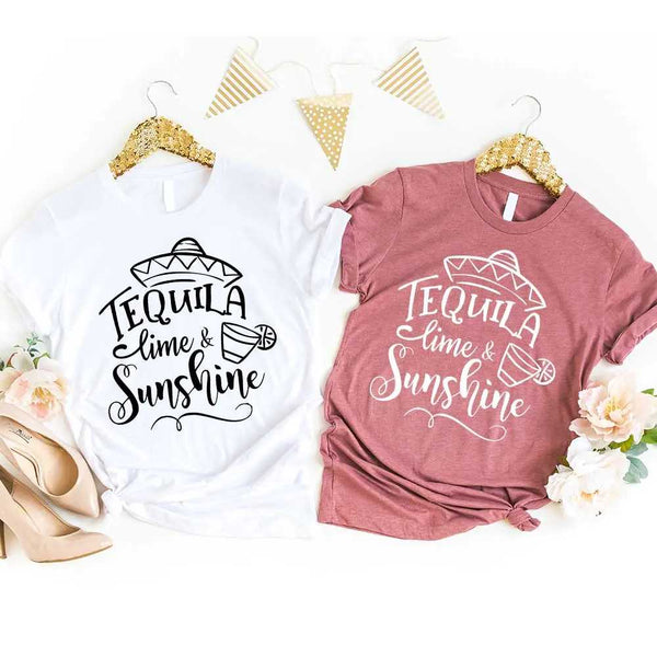 May include two people wearing matching best friend graphic t-shirts with “Tequila, Lime & Sunshine” text.