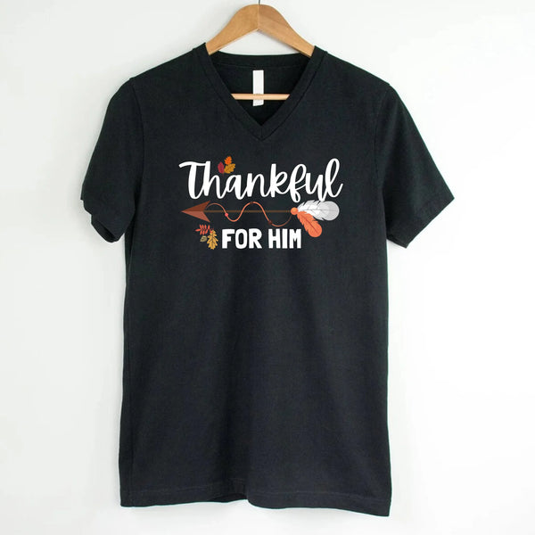 May include a pair of matching V-neck T-shirts with the phrases “Thankful For Her” and “Thankful For Him,” designed for couples celebrating Thanksgiving together.