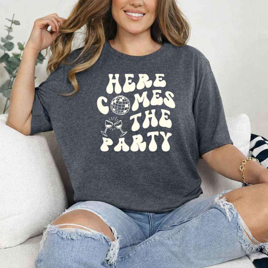 May include Dark Heather bachelorette-themed T-shirt reading “Vino Before Vows,” featuring playful typography and celebratory bridal party design elements!