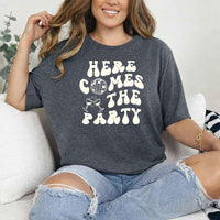 May include Dark Heather bachelorette-themed T-shirt reading “Vino Before Vows,” featuring playful typography and celebratory bridal party design elements!