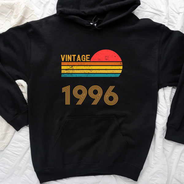 May include a personalized vintage-style hoodie with a retro sun graphic and customizable year text printed on the front.
