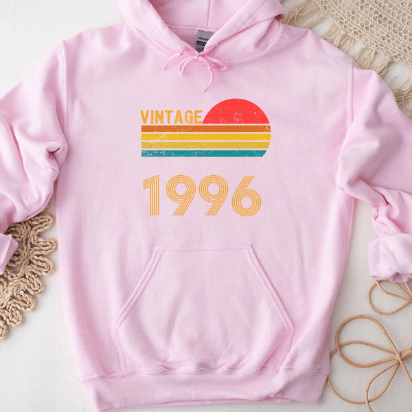 May include a personalized vintage-style hoodie with a retro sun graphic and customizable year text printed on the front.