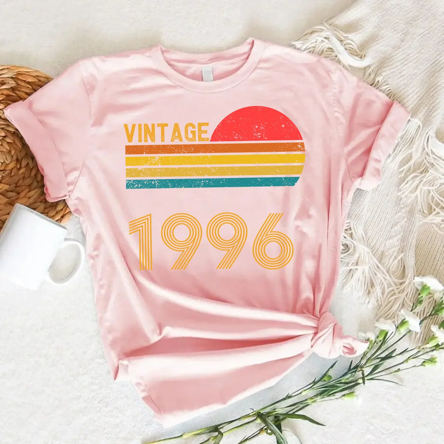 May include a personalized vintage-style t-shirt with a retro sun graphic and customizable year text printed on the front.