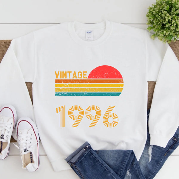 May include a personalized vintage-style sweatshirt with a retro sun graphic and customizable year text printed on the front.