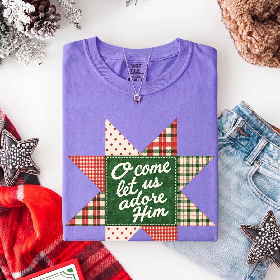 May include an O Come Let Us Adore Him Comfort Colors Christmas T-Shirt featuring a Christian holiday message inspired by a beloved Christmas hymn, designed for church services, family gatherings, worship events, and meaningful seasonal gifting.