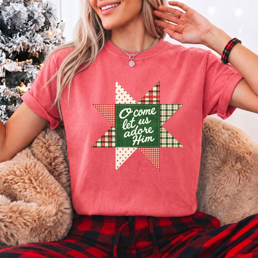 May include an O Come Let Us Adore Him Comfort Colors Christmas T-Shirt featuring a Christian holiday message inspired by a beloved Christmas hymn, designed for church services, family gatherings, worship events, and meaningful seasonal gifting.