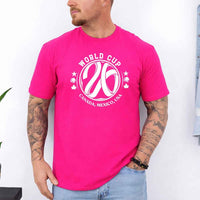 May include a person wearing a Heliconia colored 2026 World Cup T-shirt featuring bold soccer graphic and relaxed fit.