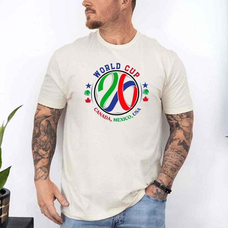 May include a person wearing a Soft Cream colored 2026 World Cup T-shirt featuring bold soccer graphic and relaxed fit.