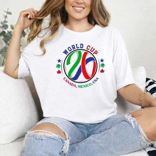 May include a person wearing a White colored 2026 World Cup T-shirt featuring bold soccer graphic and relaxed fit.