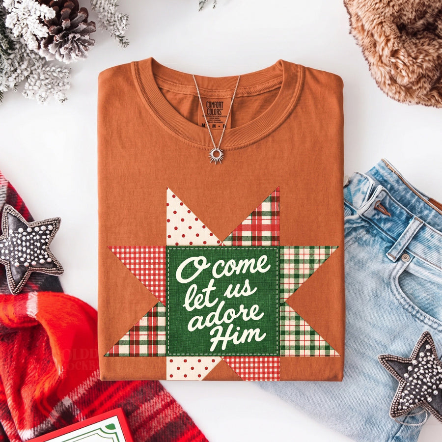 May include an O Come Let Us Adore Him Comfort Colors Christmas T-Shirt featuring a Christian holiday message inspired by a beloved Christmas hymn, designed for church services, family gatherings, worship events, and meaningful seasonal gifting.