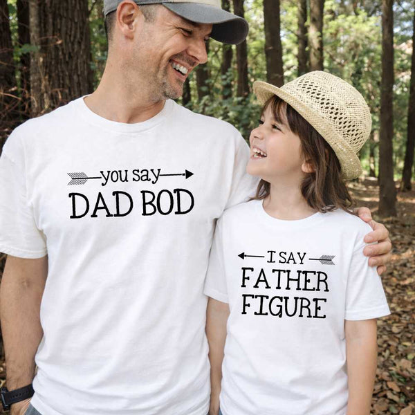 May include a person wearing a funny dad graphic t-shirt with the phrase “You Say Dad Bod, I Say Father Figure”.