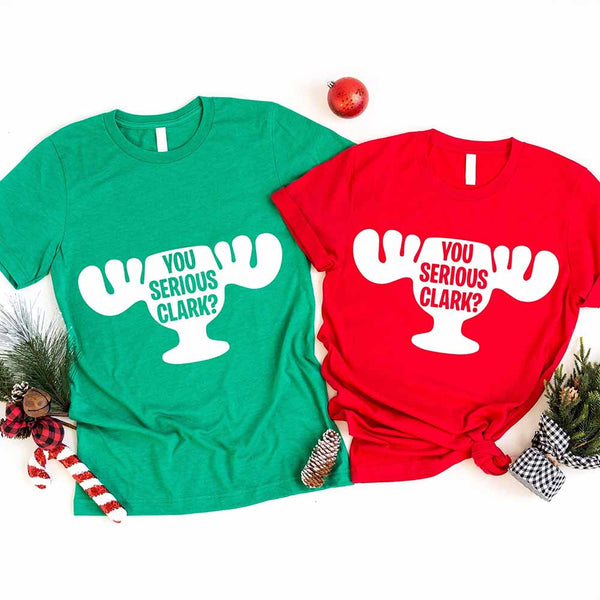Green and red t-shirts with 'You Serious Clark?' text on a white background