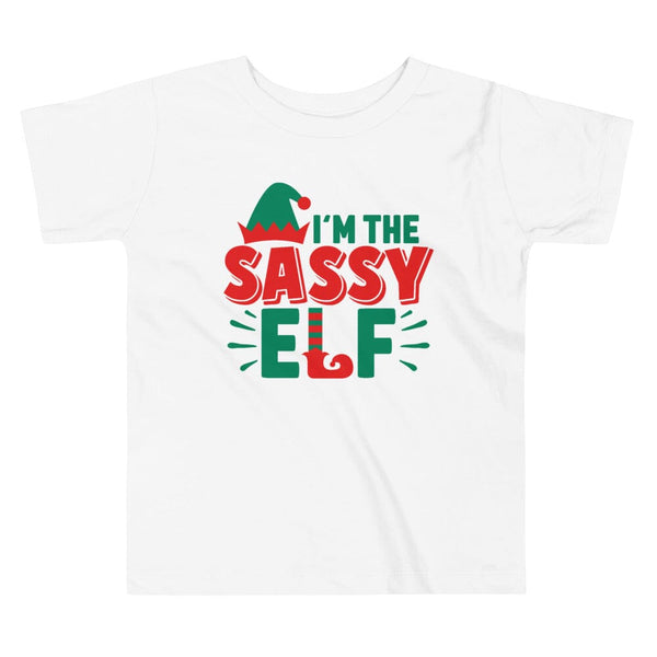 May include a toddler Christmas tee with a playful elf graphic printed on the front, presented on a plain background.